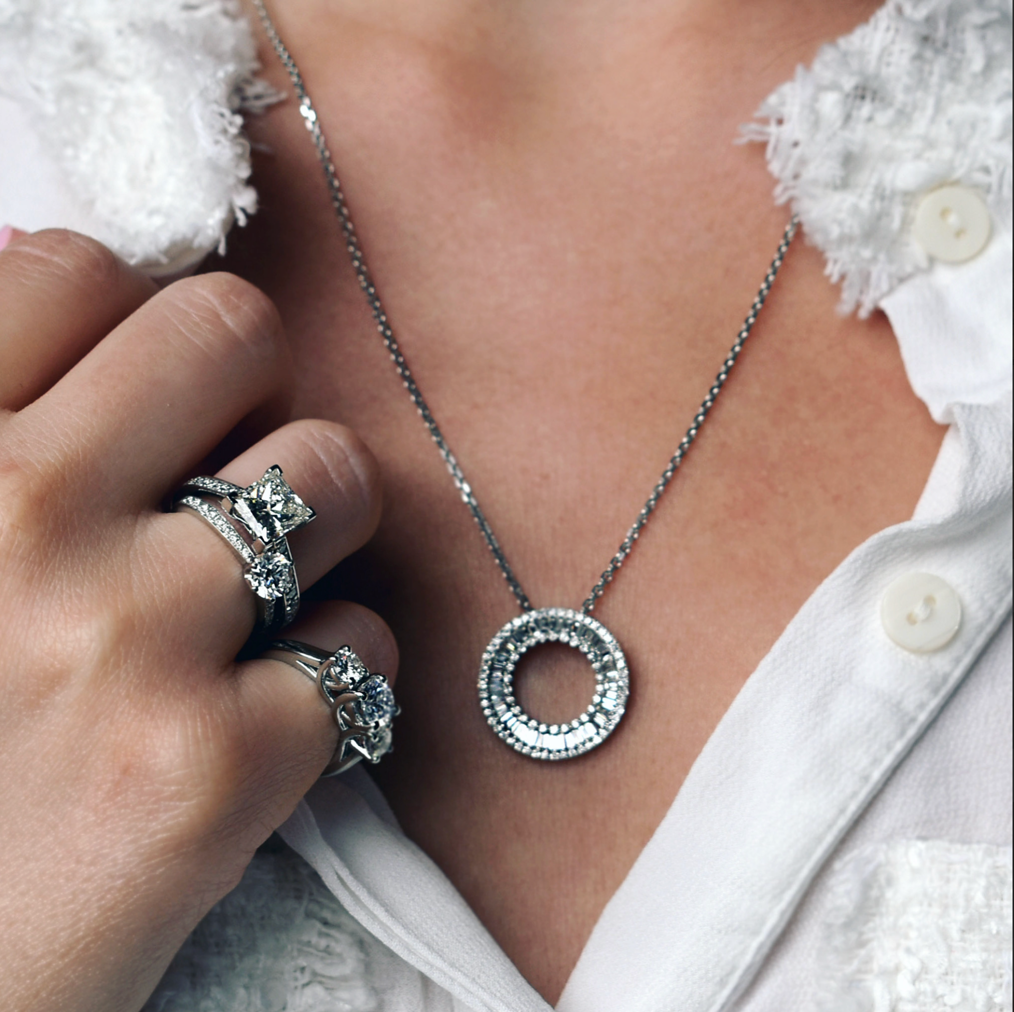 Baguette diamond pendant and engagement rings featuring a three stone design, round and princess cut stones in Dublin, London, Manchester, Ireland and the UK. Fine jewellery, engagement and wedding rings, Bridal luxury, Irish and British craftsmanship