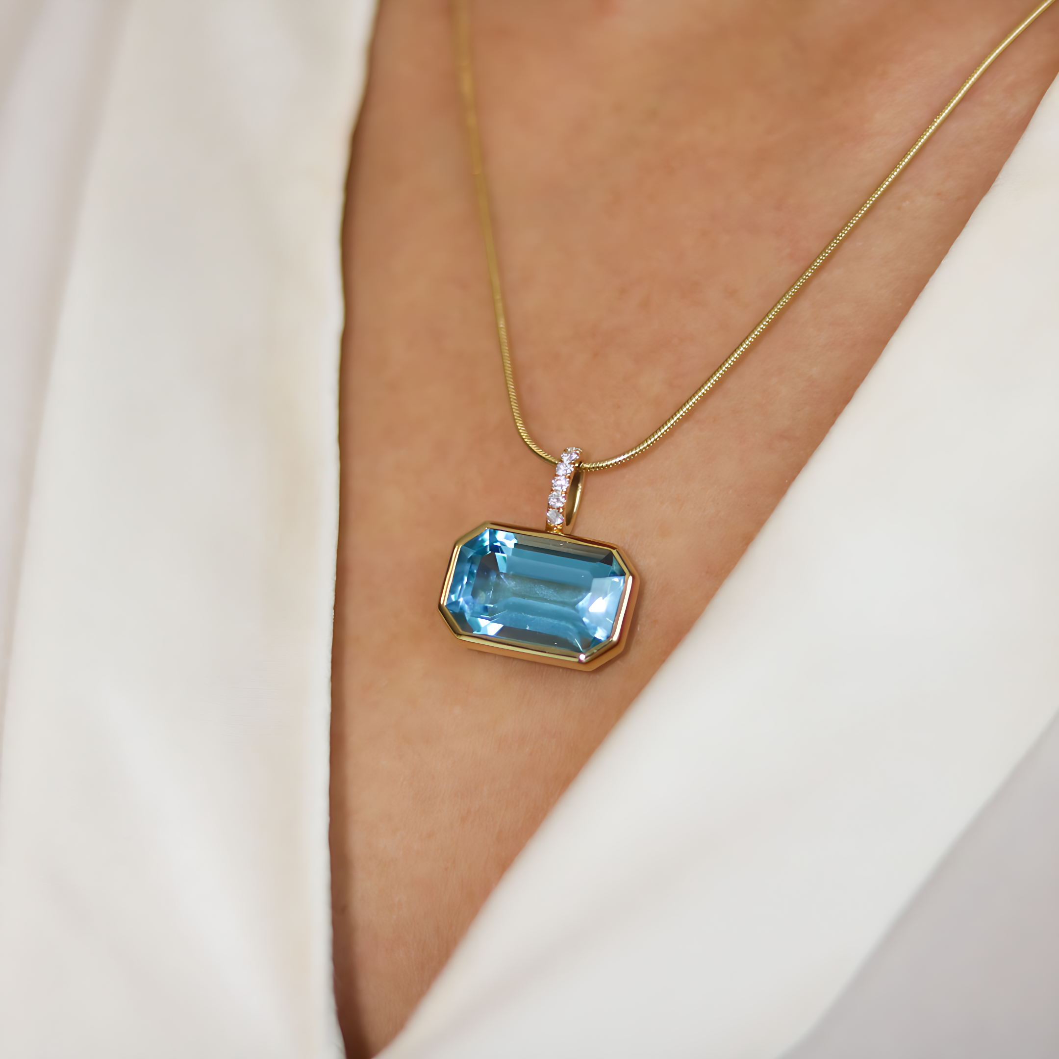 Silhouette Emerald Cut Topaz Drop Pendant – Butler Rose Jewellers
