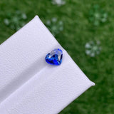 Heart shaped blue sapphire bezel set with a hidden diamond halo in platinum. Handmade luxury in the UK and Ireland for engagement rings, wedding bands, eternity rings and classic jewellery.