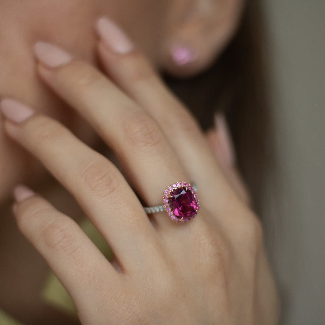 Pink Tourmaline Cushion with Pink Sapphire Halo in Rose Gold and Diamond Set Platinum Band. Handmade luxury in the UK and Ireland for engagement rings, wedding bands, eternity rings and classic jewellery.