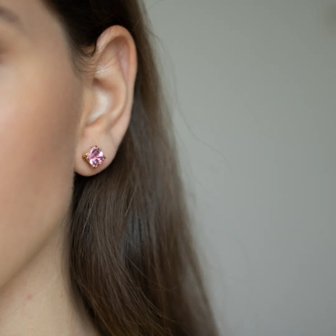 Asscher cut blush pink tourmalines set in an 18ct rose gold stud earrings. Handmade luxury in the UK and Ireland for engagement rings, wedding bands, eternity rings and classic jewellery.