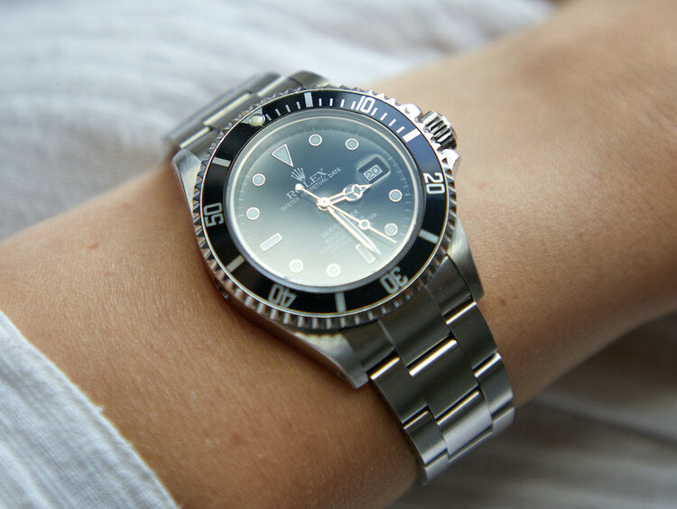Rolex Submariner watch in steel featuring a black bezel in Dublin, London, Manchester, Ireland and the UK. Fine jewellery, engagement and wedding rings, Bridal luxury, Irish and British craftsmanship, timepiece