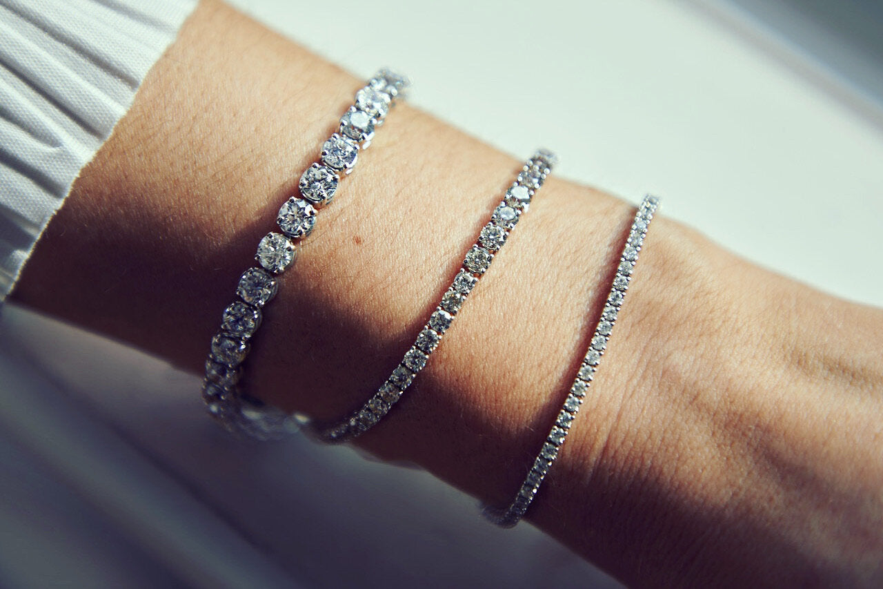 Tennis bracelets in platinum featuring round brilliant cut diamonds in Dublin, London, Manchester, Ireland and the UK. Fine jewellery, engagement and wedding rings, Bridal luxury, Irish and British craftsmanship, timepiece