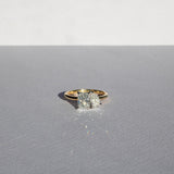 Toi et Moi with radiant cut and pear cut diamonds with platinum claws on an 18ct yellow gold band. Handmade luxury in the UK and Ireland for engagement rings, wedding bands, eternity rings and classic jewellery.