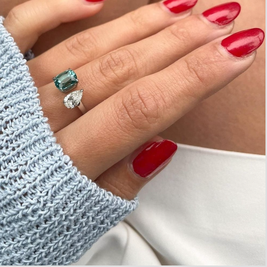 Toi et Moi ring featuring a cushion cut green tourmaline and a pear cut diamond in Dublin, London, Manchester, Ireland and the UK. Fine jewellery, engagement and wedding rings, Bridal luxury, Irish and British craftsmanship