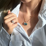 Silhouette Emerald Cut Topaz Drop Pendant Butler and Rose Jewellers
