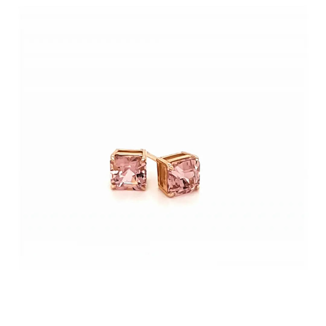 Asscher cut blush pink tourmalines set in an 18ct rose gold stud earrings. Handmade luxury in the UK and Ireland for engagement rings, wedding bands, eternity rings and classic jewellery.