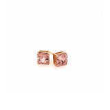 Asscher cut blush pink tourmalines set in an 18ct rose gold stud earrings. Handmade luxury in the UK and Ireland for engagement rings, wedding bands, eternity rings and classic jewellery.