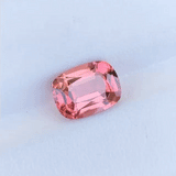 2.81cts Pinky-Orange Tourmaline w/ diamond claws and shoulders. Cushion cut pink-orange tourmaline with diamond set claws, and diamond set band. Handmade luxury in the UK and Ireland for engagement rings, wedding bands, eternity rings and classic jewellery.