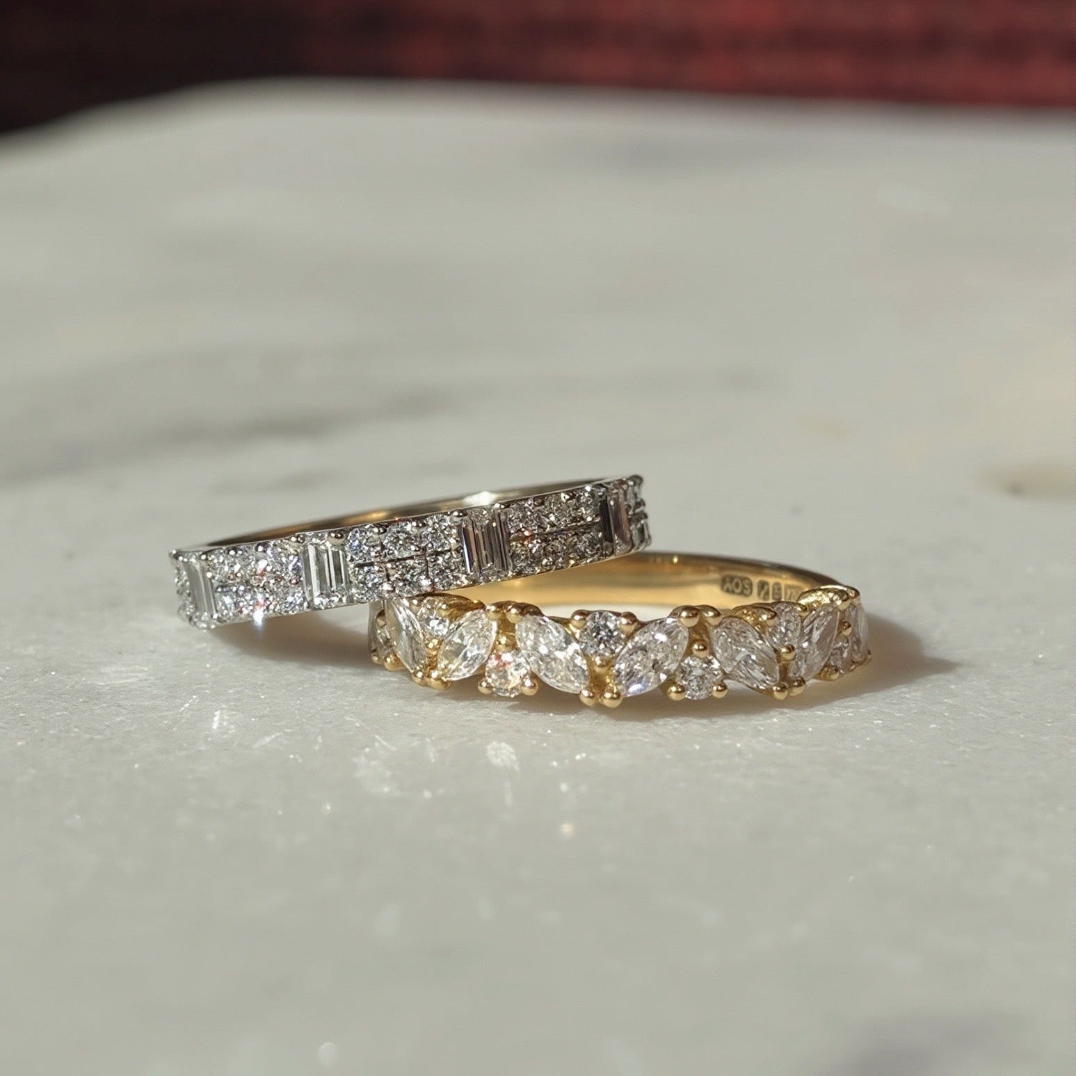 Gold diamond eternity bands, marquise diamond ring and baguette diamond rings.