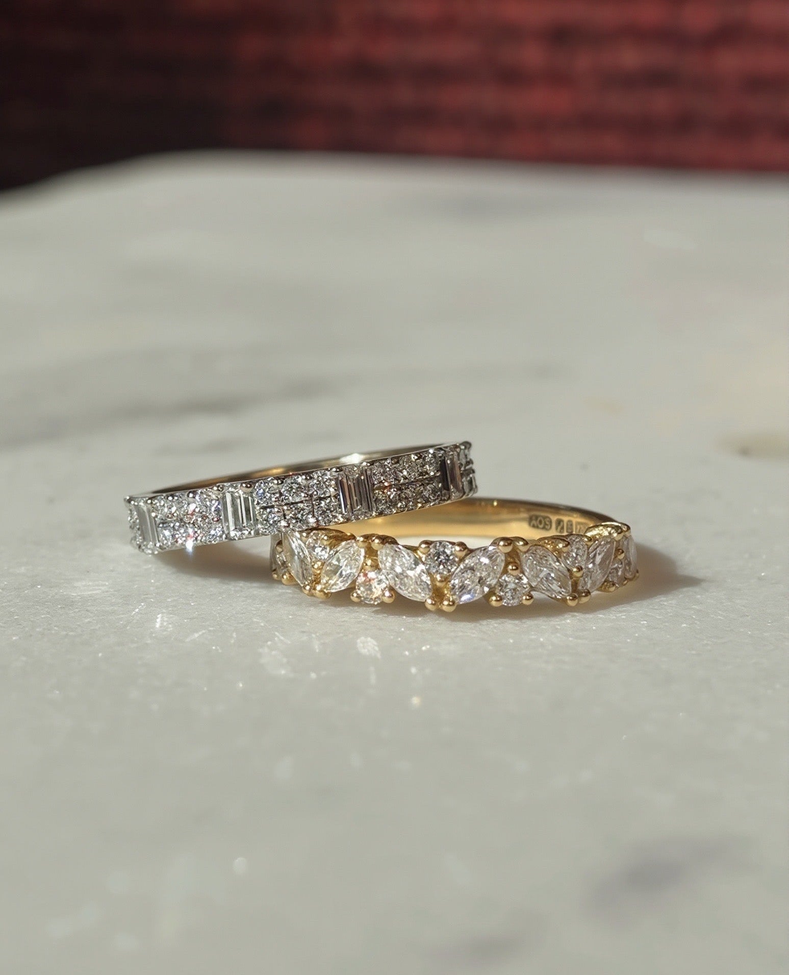 Gold diamond eternity bands, marquise diamond ring and baguette diamond rings.