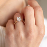 Oval diamond engagement ring, 18ct Gold band, and hidden diamond halo. Designer ring made in Dublin