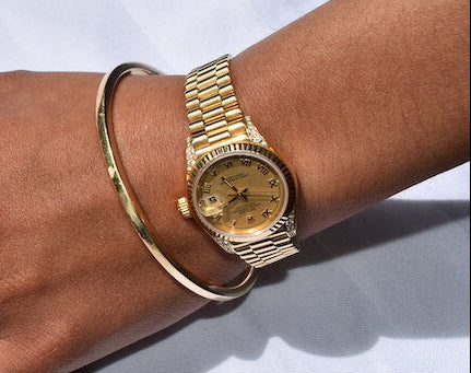 Rolex Datejust watch in 18ct yellow gold featuring a calendar function and fluted bezel in Dublin, London, Manchester, Ireland and the UK. Fine jewellery, engagement and wedding rings, Bridal luxury, Irish and British craftsmanship, timepiece