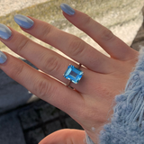 emerald cut topaz gemstone ring. Setting in silver, made in Dublin. Brides something blue jewellery.
