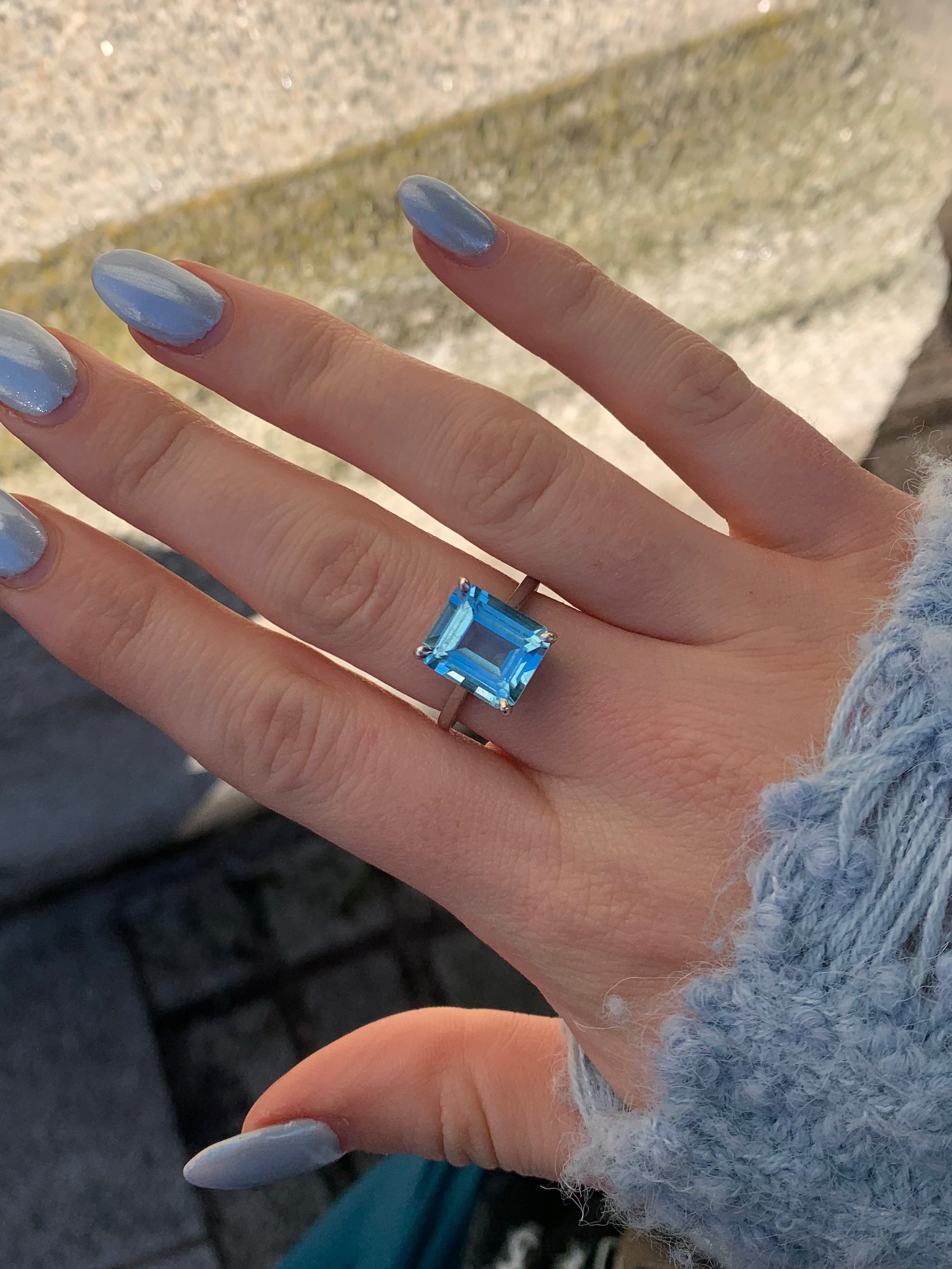 emerald cut topaz gemstone ring. Setting in silver, made in Dublin. Brides something blue jewellery.