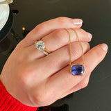 5.34ct Cushion Tanzanite pendant, set in 18ct yellow gold. With a Diamond solitaire engagement ring and Diamond pave wedding eternity band in platinum, made in dublin by Butler & Rose jewellers.