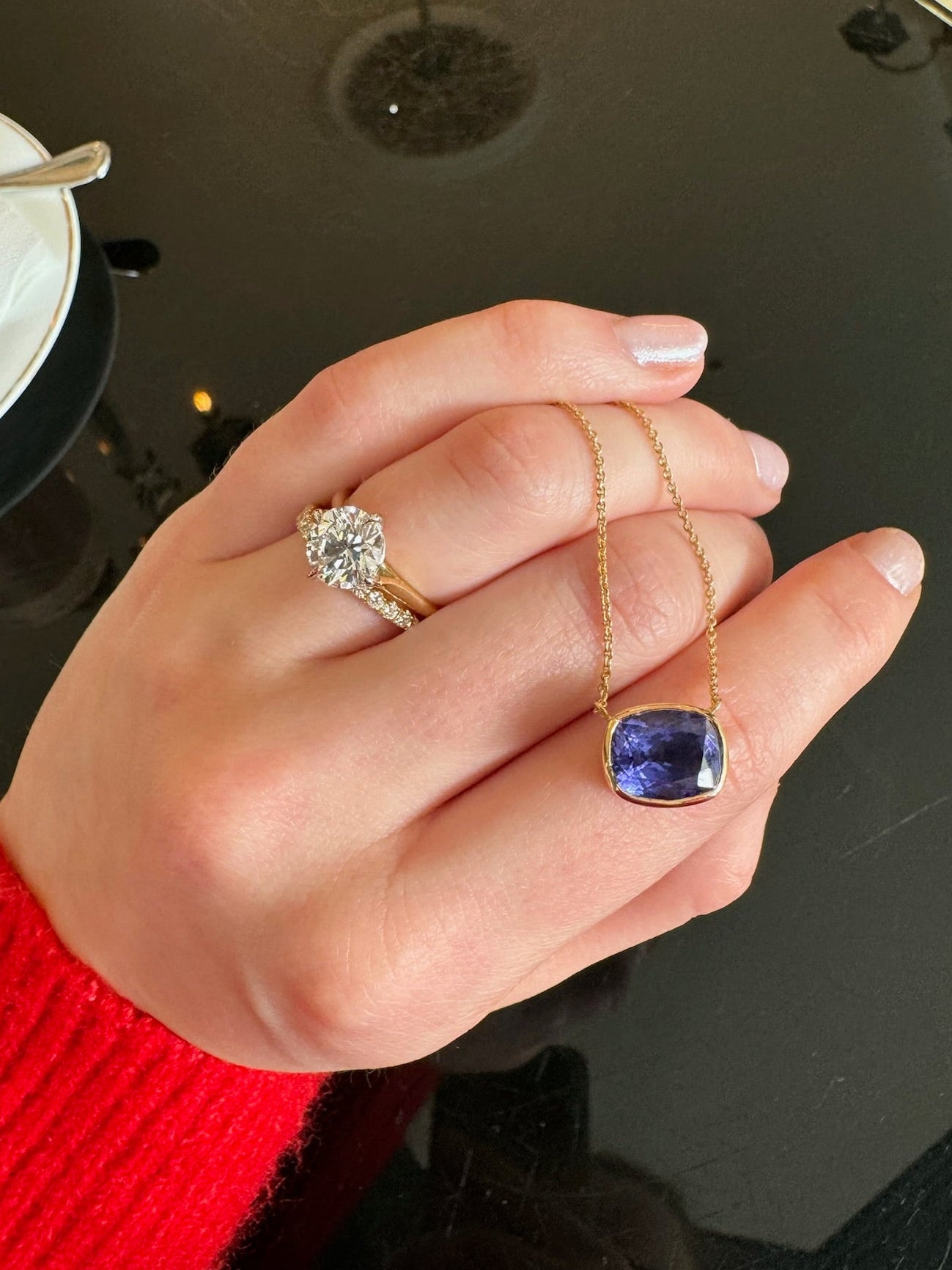 5.34ct Cushion Tanzanite pendant, set in 18ct yellow gold. With a Diamond solitaire engagement ring and Diamond pave wedding eternity band in platinum, made in dublin by Butler & Rose jewellers.