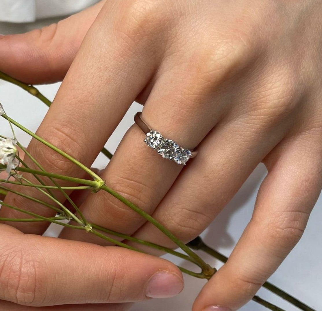 Platinum and diamond engagement ring featuring three round brilliant diamonds for bridal wear in Dublin, London, Manchester, Ireland and the UK. Fine jewellery, engagement and wedding rings, Bridal jewellery, Irish and British craftsmanship